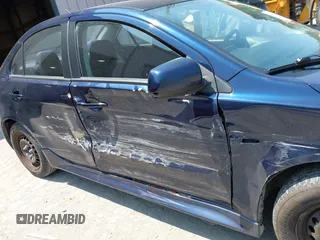 2014 Mitsubishi Lancer ES with VIN JA32U2FU1EU017892, listed as a IAAI auction lot 42392598 with 211,856 mi miles and . Bid and sale history available at DreamBid. Image 6.