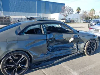 2023 Audi S5 Premium Plus with VIN WAUP4AF58PA001748, listed as a IAAI auction lot 41194878 with 33,877 mi miles and . Bid and sale history available at DreamBid. Image 17.