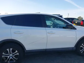 2018 Toyota RAV4 LE with VIN 2T3ZFREV8JW467744, listed as a IAAI auction lot 41818614 with 95,609 mi miles. Bid and sale history available at carsss.com. Image 14.