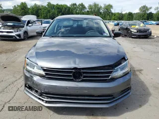 2015 Volkswagen Jetta S with VIN 3VW2K7AJ5FM327788, listed as a Copart auction lot 64034985 with 43,172 mi miles and Salvage title. Bid and sale history available at DreamBid. Image 5.