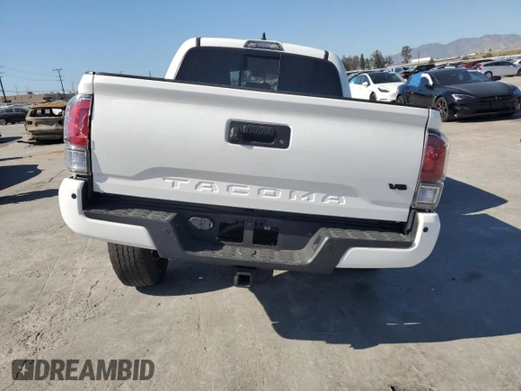 2020 Toyota Tacoma SR5 with VIN 3TMAZ5CN8LM115056, listed as a Copart auction lot 46948805 with 87,713 mi miles and Salvage title. Bid and sale history available at DreamBid. Image 6.