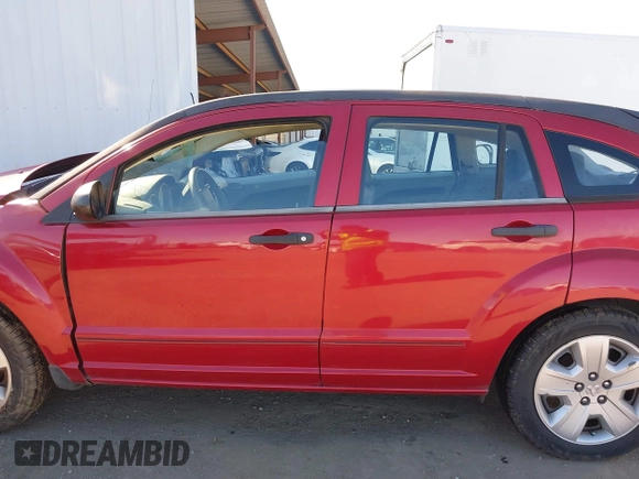 2007 Dodge Caliber SXT with VIN 1B3JB48B07D506489, listed as a IAAI auction lot 41664428 with 162,137 mi miles and . Bid and sale history available at DreamBid. Image 14.