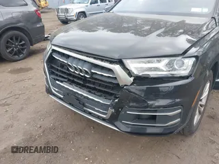 2019 Audi Q7 Premium with VIN WA1AAAF74KD002299, listed as a IAAI auction lot 42066717 with 91,898 mi miles and . Bid and sale history available at DreamBid. Image 6.