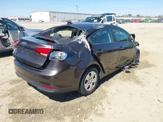 2018 Kia Forte LX with VIN 3KPFL4A71JE201144, listed as a IAAI auction lot 41874778 with 100,980 mi miles. Bid and sale history available at carsss.com. Image 4.