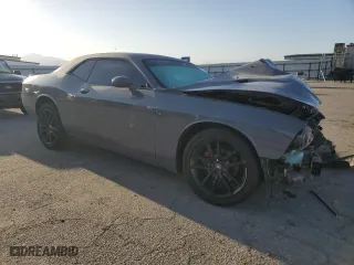 2012 Dodge Challenger SXT with VIN 2C3CDYAG7CH225015, listed as a Copart auction lot 51009695 with 120,915 mi miles and Salvage Title. Bid and sale history available at carsss.com. Image 4.