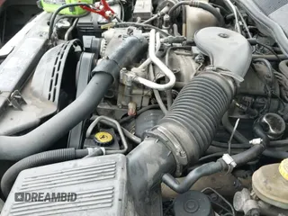 1997 Jeep Grand Cherokee Laredo with VIN 1J4GZ58Y5VC646744, listed as a IAAI auction lot 43294062 with 260,095 mi miles and . Bid and sale history available at DreamBid. Image 14.