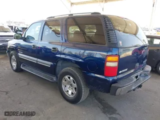 2003 Chevrolet Tahoe LS with VIN 1GNEC13V23R244296, listed as a IAAI auction lot 41999004 with 272,455 mi miles. Bid and sale history available at carsss.com. Image 3.