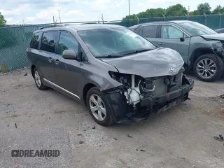 2015 Toyota Sienna LE AAS with VIN 5TDKK3DC8FS688568, listed as a IAAI auction lot 42711979 with 131,606 mi miles and . Bid and sale history available at DreamBid. Image 1.