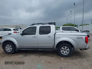 2005 Nissan Frontier LE with VIN 1N6AD07U25C457977, listed as a IAAI auction lot 41906592 with 256,116 mi miles and . Bid and sale history available at DreamBid. Image 15.