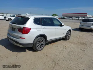 2015 BMW X3 xDrive28i with VIN 5UXWX9C58F0D53436, listed as a IAAI auction lot 41878069 with 143,587 mi miles. Bid and sale history available at carsss.com. Image 4.