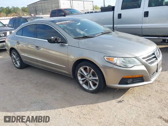 2010 Volkswagen CC Lux with VIN WVWHN7AN4AE530337, listed as a IAAI auction lot 41244342 with 100,819 mi miles. Bid and sale history available at carsss.com. Image 1.