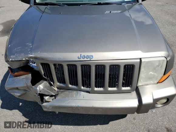 2006 Jeep Commander z VIN 1J8HG48K66C273648, wystawiony jako Copart lot #51920715 z przebiegiem 210 848 mil mil oraz Nie do naprawy • Non repairable. Historia ofert i sprzedaży dostępna na DreamBid. Obrazek 14.