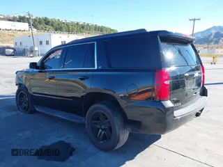 2017 Chevrolet Tahoe LT with VIN 1GNSCBKC4HR187227, listed as a IAAI auction lot 37971302 with 95,009 mi miles and . Bid and sale history available at DreamBid. Image 3.