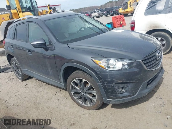 2016 Mazda CX-5 Grand Touring with VIN JM3KE4DY9G0845707, listed as a IAAI auction lot 41709685 with 96,351 mi miles. Bid and sale history available at carsss.com. Image 1.