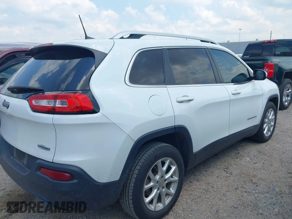 2018 Jeep Cherokee Latitude Plus with VIN 1C4PJLLBXJD590695, listed as a IAAI auction lot 39653845 with 76,667 mi miles and . Bid and sale history available at DreamBid. Image 4.