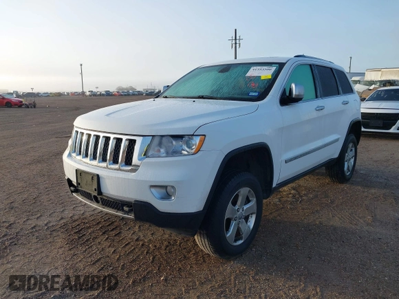 2013 Jeep Grand Cherokee Overland with VIN 1C4RJFCT1DC525098, listed as a IAAI auction lot 41593500 with 80,412 mi miles. Bid and sale history available at carsss.com. Image 2.