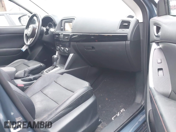 2015 Mazda CX-5 Grand Touring with VIN JM3KE4DY0F0493969, listed as a IAAI auction lot 41581885 with 71,014 mi miles. Bid and sale history available at carsss.com. Image 5.
