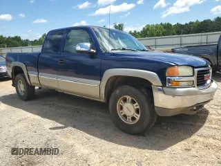 2002 GMC Sierra 1500 SLE with VIN 2GTEK19T621378897, listed as a Copart auction lot 60898315 with 137,509 mi miles and Salvage title. Bid and sale history available at DreamBid. Image 4.
