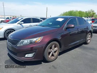 2014 Kia Optima LX with VIN 5XXGM4A77EG303496, listed as a IAAI auction lot 42572421 with 117,151 mi miles and . Bid and sale history available at DreamBid. Image 12.