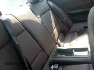 2013 BMW 1 Series 128i z VIN WBAUP9C58DVS95329, wystawiony jako Copart lot #56986015 z przebiegiem 115 518 mil mil oraz Szkoda całkowita • Salvage title. Historia ofert i sprzedaży dostępna na DreamBid. Obrazek 10.