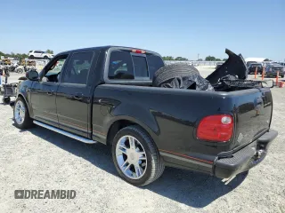 2001 Ford F-150 XLT with VIN 1FTRW07LX1KB47311, listed as a Copart auction lot 58848395 with Not provided miles and Salvage title. Bid and sale history available at DreamBid. Image 2.