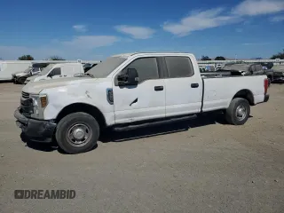 2019 Ford F-250 XL with VIN 1FT7W2A6XKEG76232, listed as a Copart auction lot 60984495 with 120,514 mi miles and Salvage title. Bid and sale history available at DreamBid. Image 1.