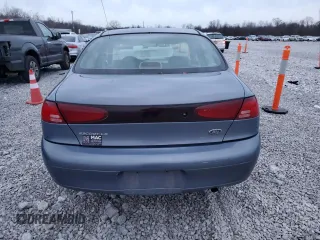 1999 Ford Escort LX with VIN 1FAFP10P6XW211371, listed as a Copart auction lot 82523444 with 122,534 mi miles and Salvage Title. Bid and sale history available at carsss.com. Image 6.