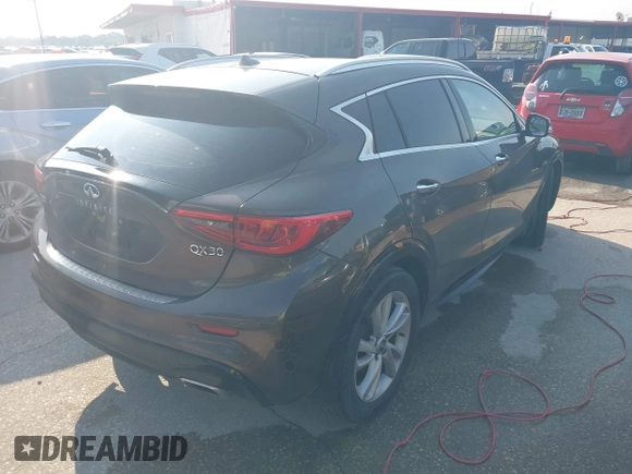 2017 Infiniti QX30 Premium z VIN SJKCH5CP4HA023330, wystawiony jako IAAI lot #42407253 z przebiegiem 132 317 mil mil oraz . Historia ofert i sprzedaży dostępna na DreamBid. Obrazek 4.
