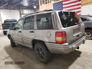 1998 Jeep Grand Cherokee Limited with VIN 1J4GZ88Z1WC289820, listed as a Copart auction lot 88583995 with 245,572 mi miles and Clean Title. Bid and sale history available at carsss.com. Image 2.