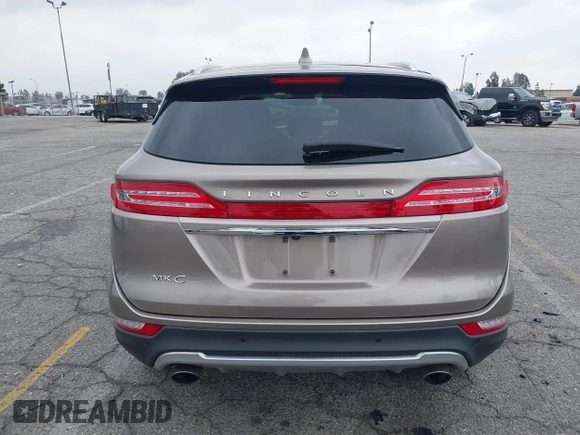 2019 Lincoln MKC Reserve with VIN 5LMCJ3C9XKUL09386, listed as a IAAI auction lot 41857681 with 66,101 mi miles and . Bid and sale history available at DreamBid. Image 17.