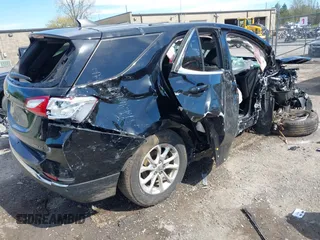2019 Chevrolet Equinox LT z VIN 3GNAXUEV1KL297594, wystawiony jako IAAI lot #42165836 z przebiegiem 85 519 mil mil oraz . Historia ofert i sprzedaży dostępna na DreamBid. Obrazek 4.