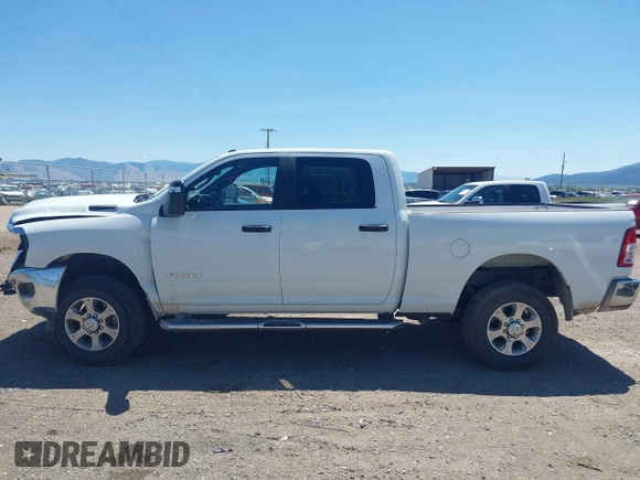 2024 Ram 2500 Big Horn with VIN 3C6UR5DJXRG275902, listed as a IAAI auction lot 42663645 with 29,066 mi miles and . Bid and sale history available at DreamBid. Image 14.
