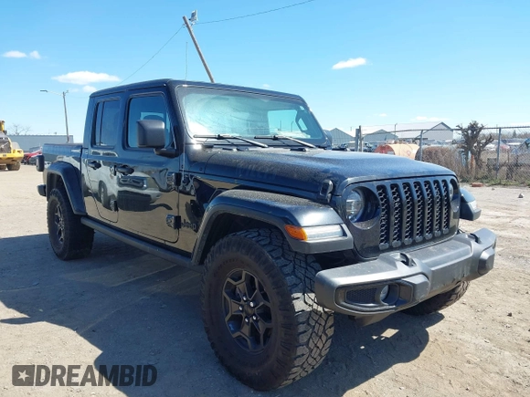 2022 Jeep Gladiator Texas Trail with VIN 1C6HJTAG2NL120506, listed as a IAAI auction lot 42048215 with 65,048 mi miles. Bid and sale history available at carsss.com. Image 1.