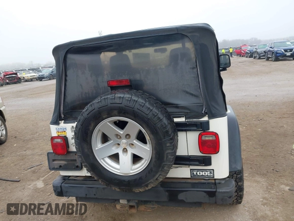 2006 Jeep Wrangler Rubicon with VIN 1J4FA69S16P710601, listed as a IAAI auction lot 41475818 with Not provided miles and . Bid and sale history available at DreamBid. Image 16.