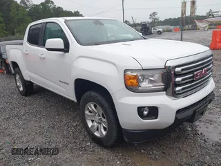 2018 GMC Canyon z VIN 1GTG5CE14J1134654, wystawiony jako IAAI lot #42203541 z przebiegiem 147 881 mil mil oraz . Historia ofert i sprzedaży dostępna na DreamBid. Obrazek 1.