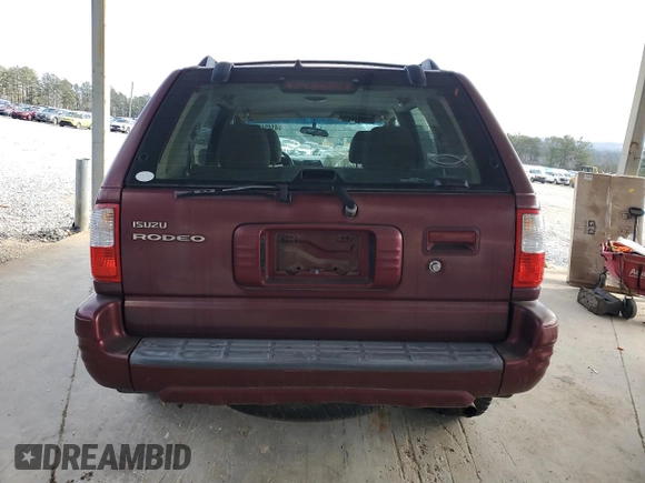 2002 Isuzu Rodeo S z VIN 4S2CK58W924328997, wystawiony jako Copart lot #41454525 z przebiegiem 110 569 mil mil oraz Szkoda całkowita • Salvage title. Historia ofert i sprzedaży dostępna na DreamBid. Obrazek 6.