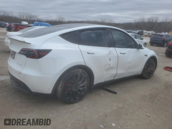 2023 Tesla Model Y Performance with VIN 7SAYGDEF0PF791552, listed as a Copart auction lot 44592545 with 29,075 mi miles and Salvage Title. Bid and sale history available at DreamBid. Image 3.