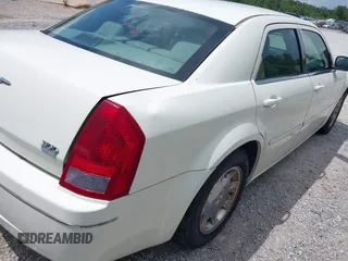 2006 Chrysler 300 Touring with VIN 2C3KA53G96H350490, listed as a IAAI auction lot 41319162 with 209,159 mi miles. Bid and sale history available at carsss.com. Image 6.