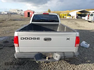 2002 Dodge Dakota with VIN 1B7GL12X42S698285, listed as a IAAI auction lot 40826030 with 211,936 mi miles and . Bid and sale history available at carsss.com. Image 17.