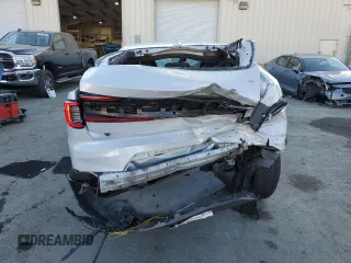 2023 Polestar 2 with VIN YSMEG3KA6PL141886, listed as a Copart auction lot 74600664 with 61,588 mi miles and Salvage Title. Bid and sale history available at carsss.com. Image 6.