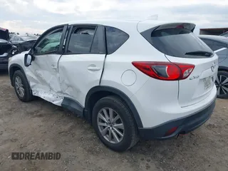 2016 Mazda CX-5 Touring with VIN JM3KE2CY5G0791537, listed as a IAAI auction lot 41396276 with 42,095 mi miles. Bid and sale history available at carsss.com. Image 3.