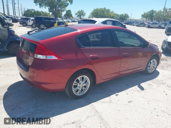 2010 Honda Insight EX with VIN JHMZE2H71AS021062, listed as a IAAI auction lot 41857350 with 45,558 mi miles and . Bid and sale history available at carsss.com. Image 4.