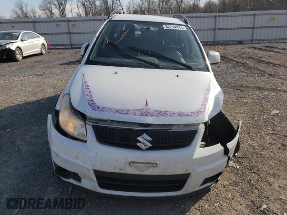 2012 Suzuki SX4 Crossover with VIN JS2YB5A32C6303887, listed as a Copart auction lot 82214144 with 0 mi miles and Salvage Title. Bid and sale history available at carsss.com. Image 5.