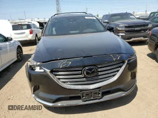 2021 Mazda CX-9 Grand Touring z VIN JM3TCBDY3M0527222, wystawiony jako Copart lot #54887005 z przebiegiem 35 674 mil mil oraz Szkoda całkowita • Salvage title. Historia ofert i sprzedaży dostępna na DreamBid. Obrazek 5.