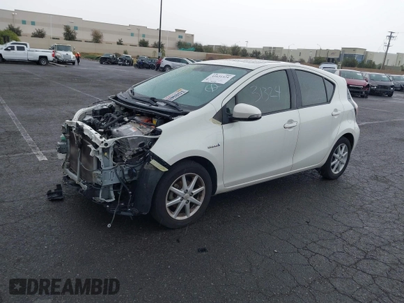 2015 Toyota Prius One with VIN JTDKDTB32F1094973, listed as a IAAI auction lot 41631324 with 177,948 mi miles and . Bid and sale history available at carsss.com. Image 2.