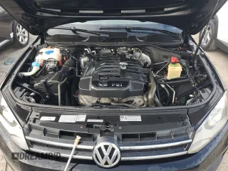 2012 Volkswagen Touareg Exec with VIN WVGEF9BP1CD011407, listed as a Copart auction lot 79199754 with 57,376 mi miles and Salvage Title. Bid and sale history available at DreamBid. Image 12.