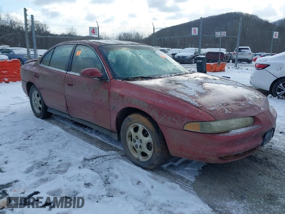 1999 Oldsmobile Intrigue GL z VIN 1G3WS52KXXF335273, wystawiony jako IAAI lot #41624543 z przebiegiem 106 606 mil mil oraz . Historia ofert i sprzedaży dostępna na DreamBid. Obrazek 1.