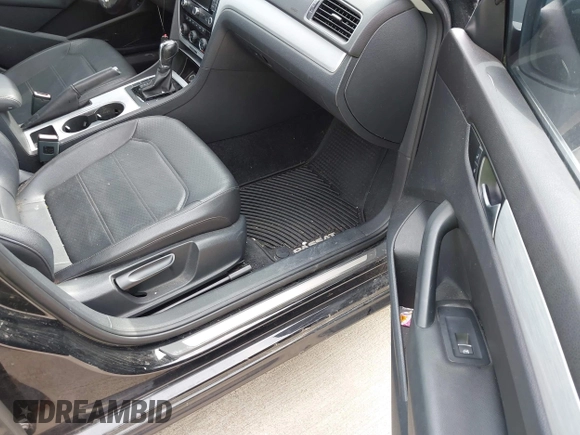 2013 Volkswagen Passat TDI SE with VIN 1VWBN7A30DC043444, listed as a IAAI auction lot 42150639 with 103,628 mi miles. Bid and sale history available at carsss.com. Image 5.