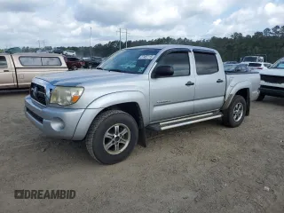 2011 Toyota Tacoma PreRunner z VIN 3TMJU4GN7BM124235, wystawiony jako Copart lot #57487115 z przebiegiem 123 833 mil mil oraz Czysty tytuł • Clean title. Historia ofert i sprzedaży dostępna na DreamBid. Obrazek 1.