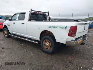 2015 Ram 2500 Tradesman z VIN 3C6TR5H29FG558981, wystawiony jako IAAI lot #41944923 z przebiegiem 262 459 mil mil oraz . Historia ofert i sprzedaży dostępna na DreamBid. Obrazek 3.